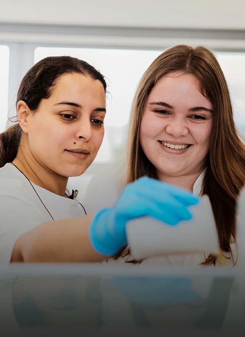 Two women are working together in the laboratory